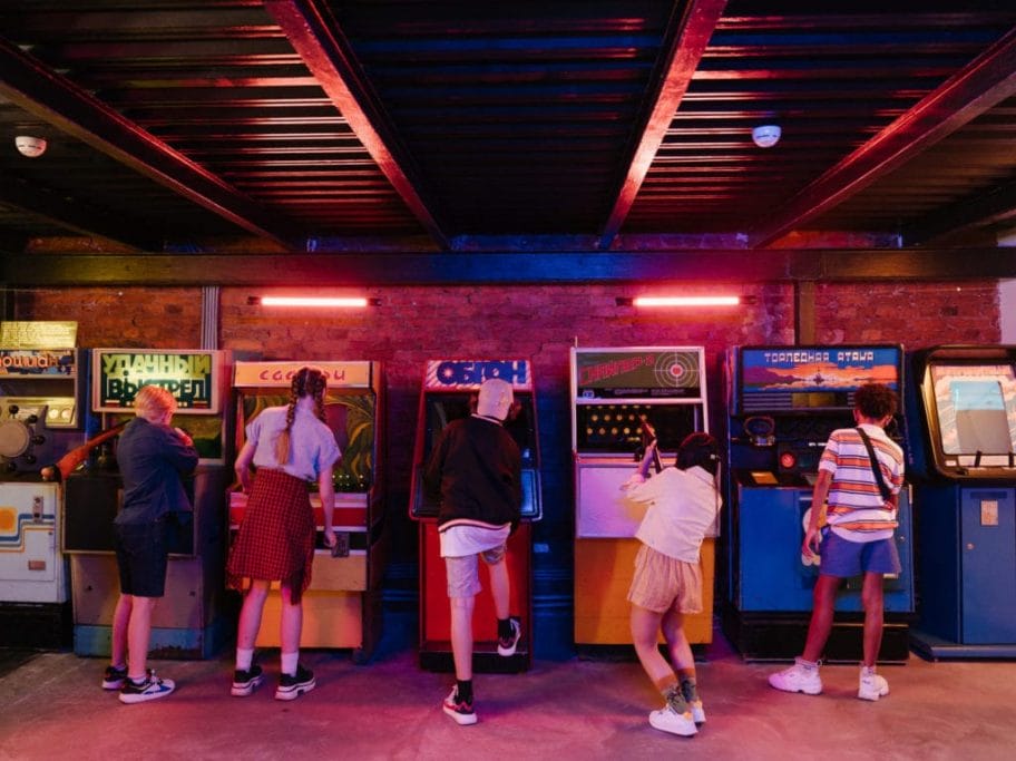 People standing in front of store during night time