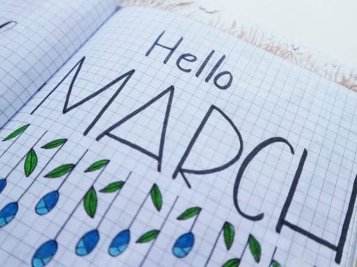 Hello march printed paper on white surface